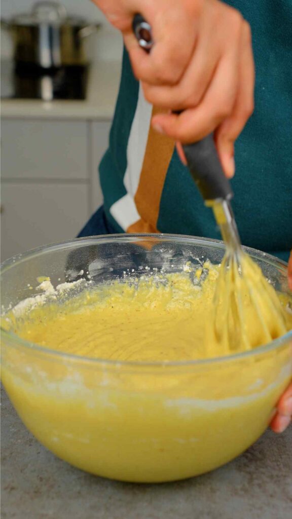 whisk pistachio sponge batter together