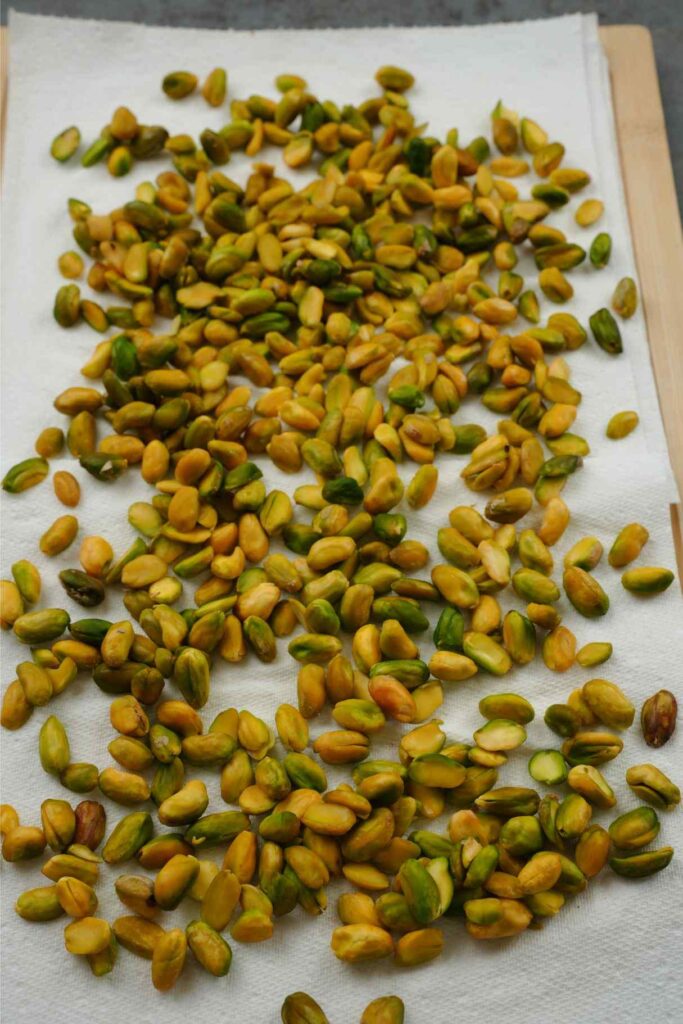 drying pistachios on a paper towel