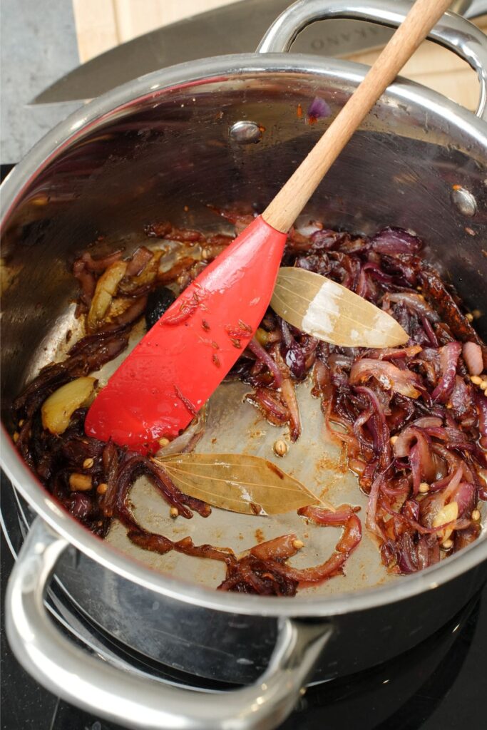 caramelising onions in a saucepan for gravy