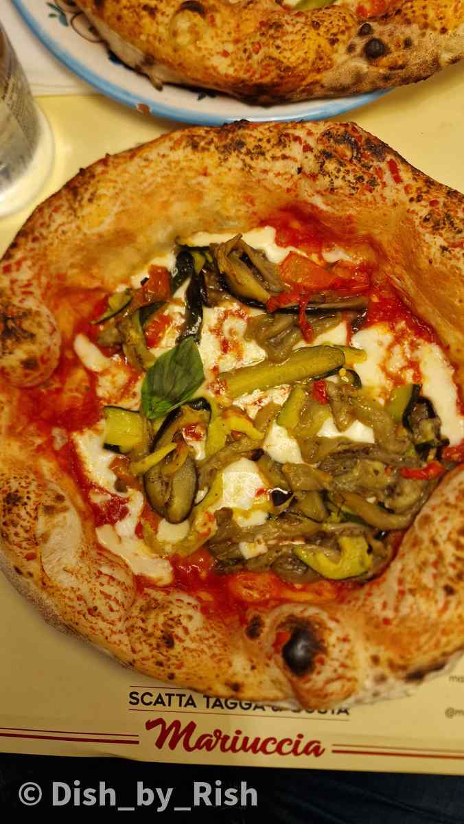 Ortolana pizza on a plate in Rome