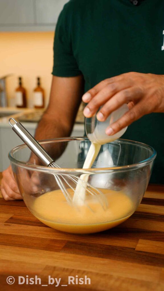 adding milk to wet mix