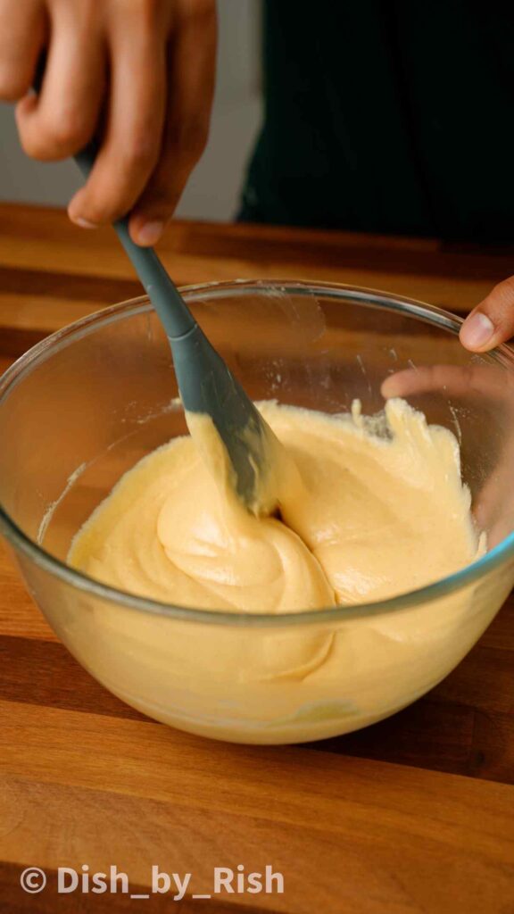 mixing doughnut batter