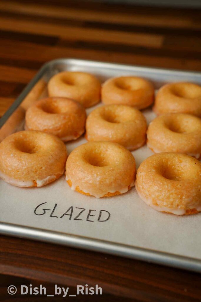 glazed baked doughnuts on a tray