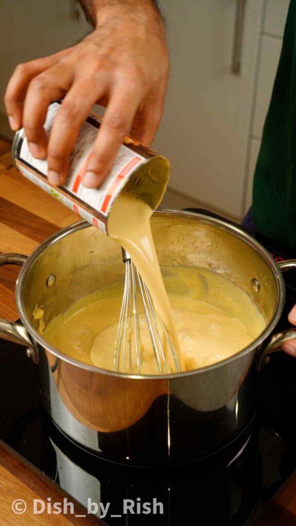 adding evaporated milk to bechamel sauce