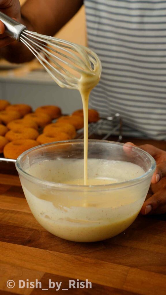 brown butter cream cheese glaze being whisked
