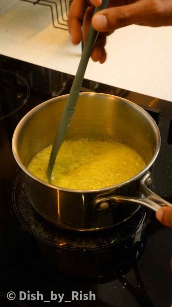 stirring melted butter and milk powder
