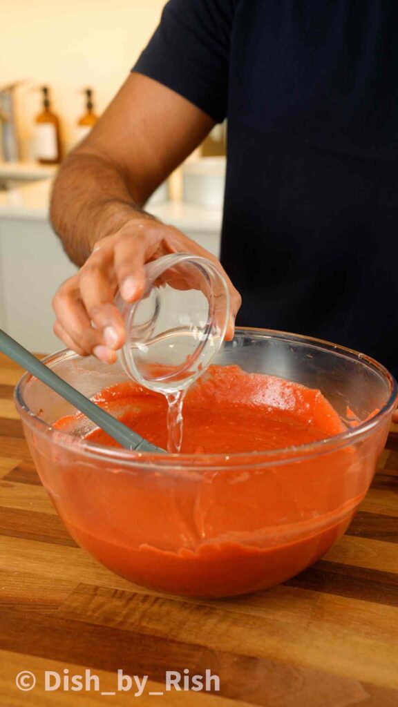 adding vinegar to red velvet cake batter