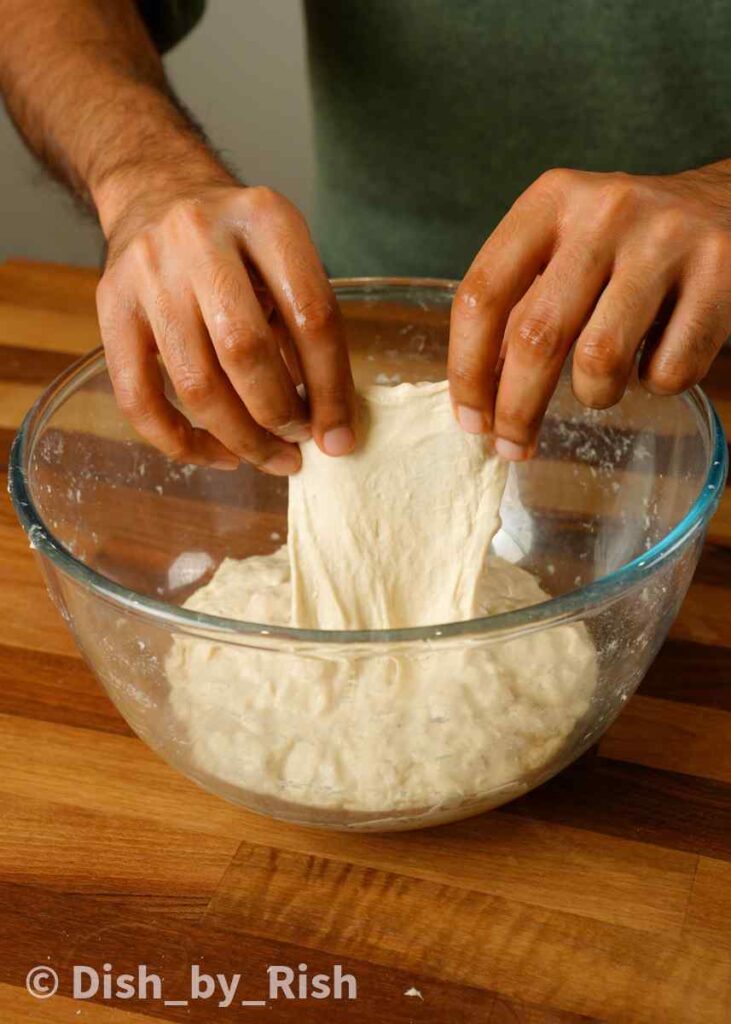 strong dough being stretched and not tearing