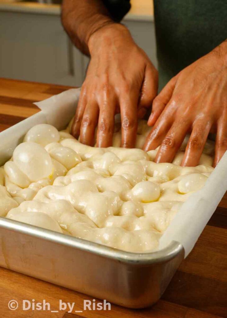 dimpling focaccia dough