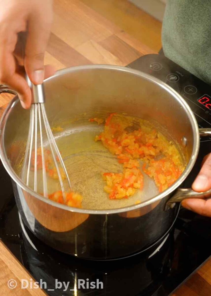 whisking aromatics and flour