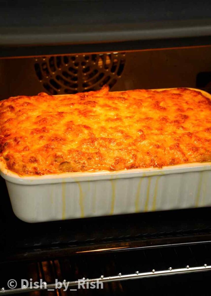 baked spicy mac and cheese with golden brown cheese crust