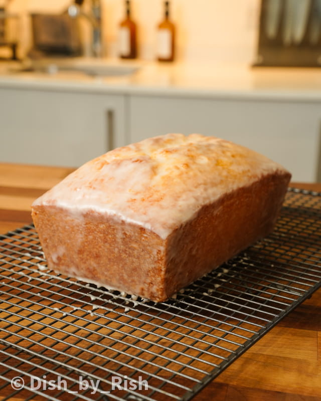 lemon drizzle cake on top of a wire rack