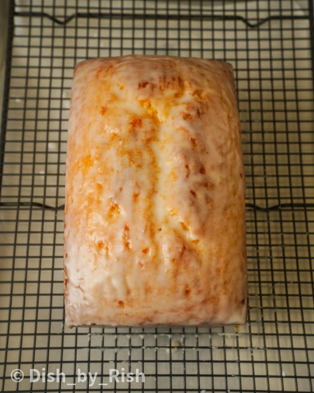 lemon loaf cake on top of a wire rack